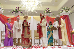 Indian bride and groom at their varmala ceremony ritual. Indian bride and groom at their varmala ceremony ritual.