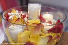 Indian wedding ceremony flowers and candles decor.