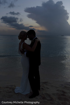 By the beach Indian bride and groom silhouette photo. By the beach Indian bride and groom silhouette photo.