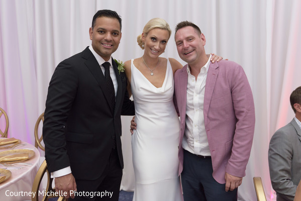 Lovely capture Indian bride and groom with guest.