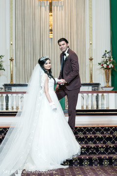Indian bride and groom looking at camera. Indian bride and groom looking at camera.