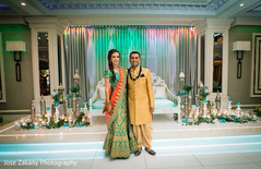 Indian bride and groom posing at the venue Indian bride and groom posing at the venue