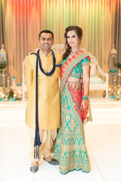 Elegant capture of Indian bride and groom at the venue Elegant capture of Indian bride and groom at the venue