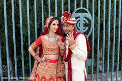 Indian bride and groom exited by showing their wedding rings. Indian bride and groom exited by showing their wedding rings.