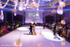 Glamorous indian bride and groom dancing photography. Glamorous indian bride and groom dancing photography.