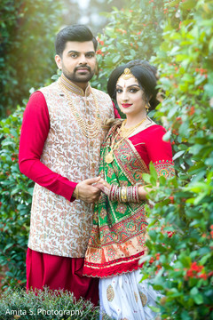 Lovely Indian couple on their ceremony outfits. Lovely Indian couple on their ceremony outfits.