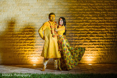 Indian groom with Turmeric paste on with bride's portrait. Indian groom with Turmeric paste on with bride's portrait.