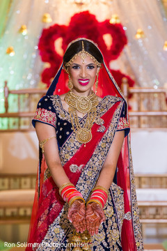 Sweet Indian bride posing on her ceremony outfit. Sweet Indian bride posing on her ceremony outfit.