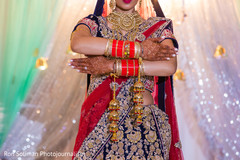 Indian bride showing mehndi art. Indian bride showing mehndi art.