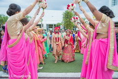 Indian couple walking hand in hand from ceremony. Indian couple walking hand in hand from ceremony.