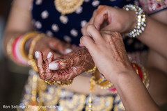 Indian bride getting her bangles on capture. Indian bride getting her bangles on capture.