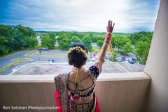 Lovely Indian bride looking out the window capture. Lovely Indian bride looking out the window capture.