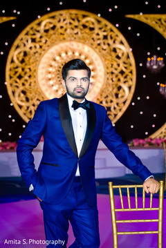 Charming Indian groom at reception portrait. Charming Indian groom at reception portrait.