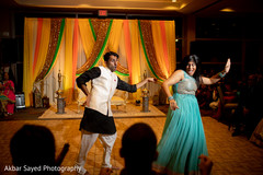 Gleeful indian sangeet dance performance. Gleeful indian sangeet dance performance.