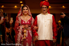 Glamorous Indian bride entering her wedding ceremony. Glamorous Indian bride entering her wedding ceremony.