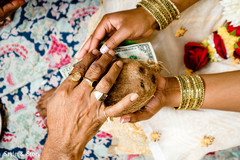 Closeup capture of the coconut pre-wedding ritual. Closeup capture of the coconut pre-wedding ritual.