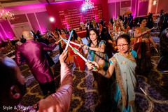 Indian wedding guests on their garba dance capture. Indian wedding guests on their garba dance capture.