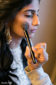Beautiful maharani being dolled up for the ceremony Beautiful maharani being dolled up for the ceremony