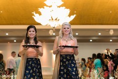 Bridesmaids making their entrance to the ceremony Bridesmaids making their entrance to the ceremony