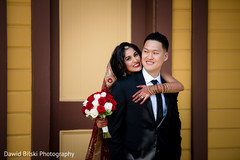 Joyful Indian couple during the photo shoot Joyful Indian couple during the photo shoot