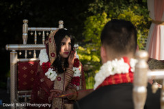 Indian bride wearing the flower garland Indian bride wearing the flower garland