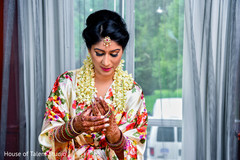 Indian bride putting bangles capture. Indian bride putting bangles capture.