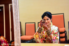 Indian bride showing her Parvathi nose ring. Indian bride showing her Parvathi nose ring.