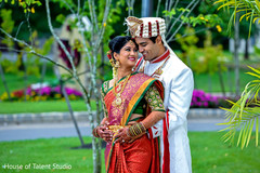 Lovely Indian couple posing outdoors. Lovely Indian couple posing outdoors.