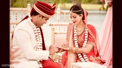 Sweet Indian couple exchanging rings. Sweet Indian couple exchanging rings.