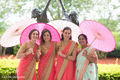 Sweet Indian bridesmaids posing for photo shoot. Sweet Indian bridesmaids posing for photo shoot.
