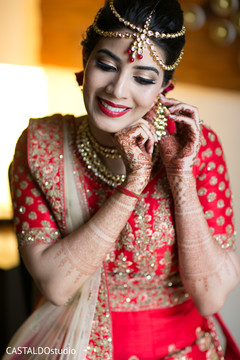 Charming indian bride getting ready scene. Charming indian bride getting ready scene.