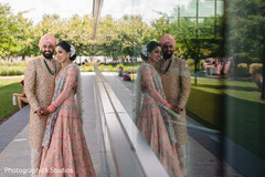 Indian newlyweds taking pictures outside Indian newlyweds taking pictures outside