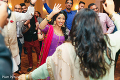 Indian bride pre-wedding sangeet dance performance capture. Indian bride pre-wedding sangeet dance performance capture.