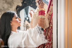 Maharani admiring her open shirt lehenga. Maharani admiring her open shirt lehenga.
