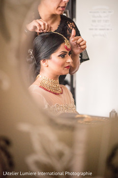 Lovely Indian bride getting her tikka on. Lovely Indian bride getting her tikka on.