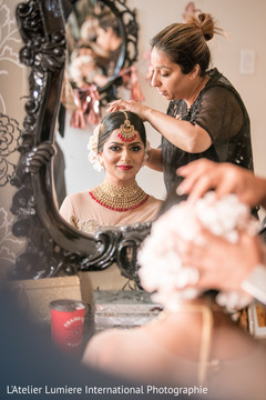 Impressive Indian bride getting her hair done. Impressive Indian bride getting her hair done.