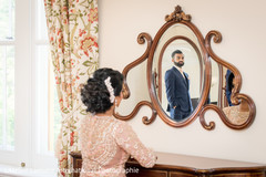 Maharani admiring her maharaja on a mirror. Maharani admiring her maharaja on a mirror.