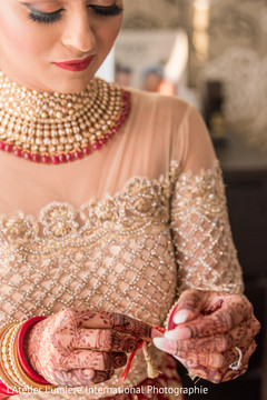 Enchanting Indian bride getting ready. Enchanting Indian bride getting ready.