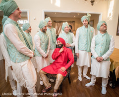 Fun capture of Indian groom with groomsmen getting ready. Fun capture of Indian groom with groomsmen getting ready.