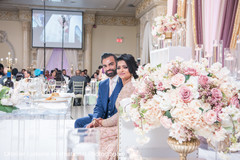 Lovely couple looking at camera at wedding reception capture. Lovely couple looking at camera at wedding reception capture.