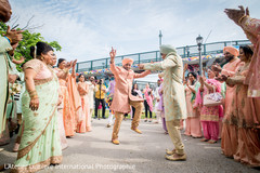 Indian groomsmen dance at the baraat celebration. Indian groomsmen dance at the baraat celebration.