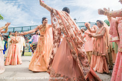 Indian bridesmaids dance at baraat celebration. Indian bridesmaids dance at baraat celebration.
