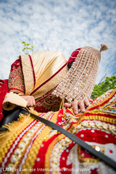 Charming Indian groom riding baraat white horse. Charming Indian groom riding baraat white horse.