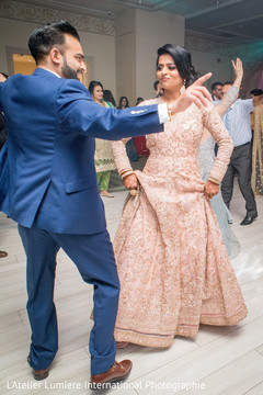 Upbeat Indian guest, bride and groom celebration. Upbeat Indian guest, bride and groom celebration.