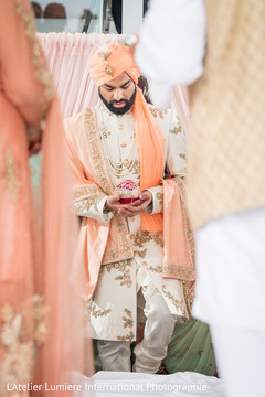 Indian groom carrying a ceremony ritual item. Indian groom carrying a ceremony ritual item.