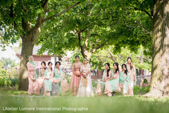 Sweet Indian bride and bridesmaids posing for photo shoot. Sweet Indian bride and bridesmaids posing for photo shoot.