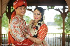 Beautiful shot of Indian couple looking at the camera Beautiful shot of Indian couple looking at the camera