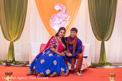 Charming Indian bride and groom holding hands. Charming Indian bride and groom holding hands.