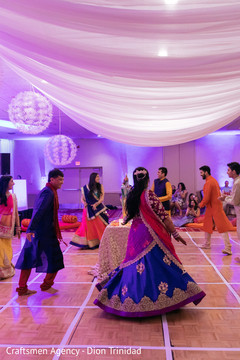 Indian groom dancing with bride and guests Indian groom dancing with bride and guests