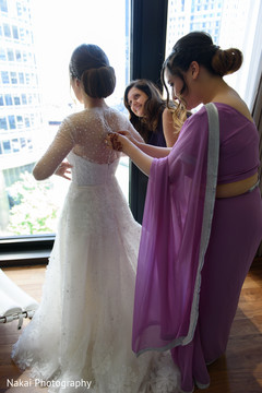Indian bridesmaids helping the beautiful maharani Indian bridesmaids helping the beautiful maharani